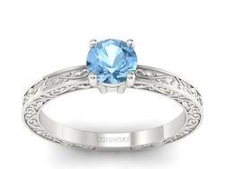 Złoty pierścionek z topazem w białym złocie próby 585 - p16278btp