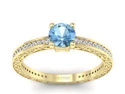 Złoty pierścionek z topazem i brylantami - p16279za