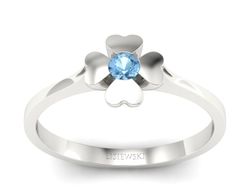 Luksusowy złoty pierścionek z topazem w białym złocie - p16285btp