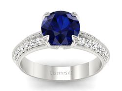 Pierścionek z szafirem i brylantami białe złoto - p16288bsz