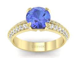 Pierścionek z tanzanitem i brylantami żółte złoto - p16288zt