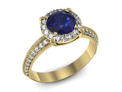 Złoty pierścionek z szafirem i diamentami - p16290zszc