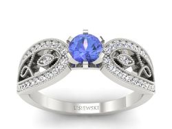 Pierścionek z tanzanitem białe złoto i brylantami - p16315bt