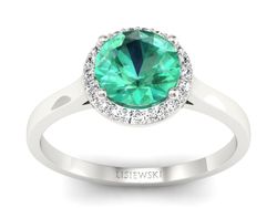 Złoty pierścionek ze szmaragdem z brylantami - p16320bsm