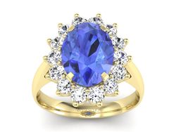 Pierścionek z tanzanitem i brylantami żółte złoto - p16327zt