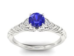 Pierścionek z szafirem i brylantami białe złoto - p16380bszc