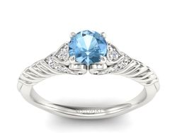 Pierścionek z topazem i brylantami białe złoto - p16380btp