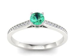 Złoty pierścionek ze szmaragdem i brylantami - p16432bsm