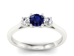 Pierścionek z szafirem i brylantami białe złoto - p16449bsz