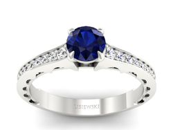 Pierścionek z szafirem i brylantami białe złoto - p16501bsz