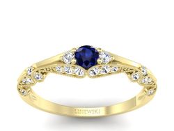 Złoty pierścionek z szafirem i diamentami - p16589zsz