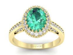 Złoty pierścionek ze szmaragdem i diamentami - p16595zsm