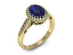Złoty pierścionek z szafirem i diamentami - p16595zszc