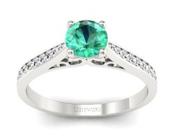 Złoty pierścionek ze szmaragdem i brylantami - p16637bsm