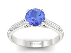 Złoty pierścionek z tanzanitem i brylantami - p16657bt