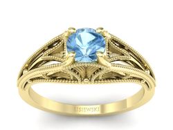 Złoty pierścionek z topazem żółte złoto - p16667ztp