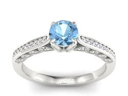 Złoty Pierścionek z topazem i brylantami 585 - p16812btp