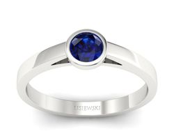 Złoty pierścionek z szafirem białe złoto - p16925bsz