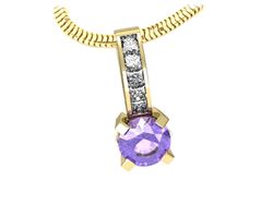 Złota zawieszka z tanzanitem i diamentami - w15095zt